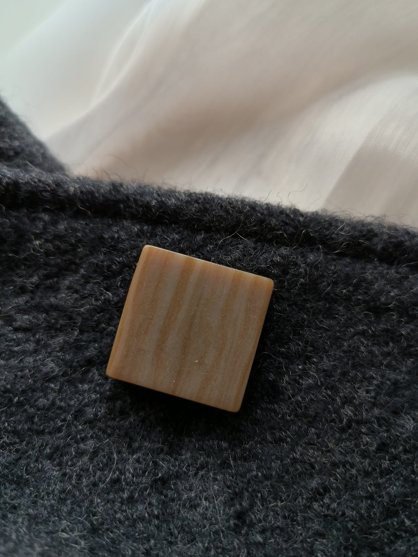 Irregular stone pattern button