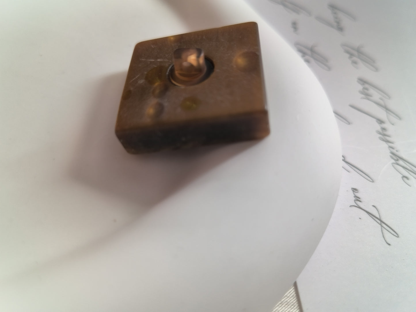 Irregular stone pattern button