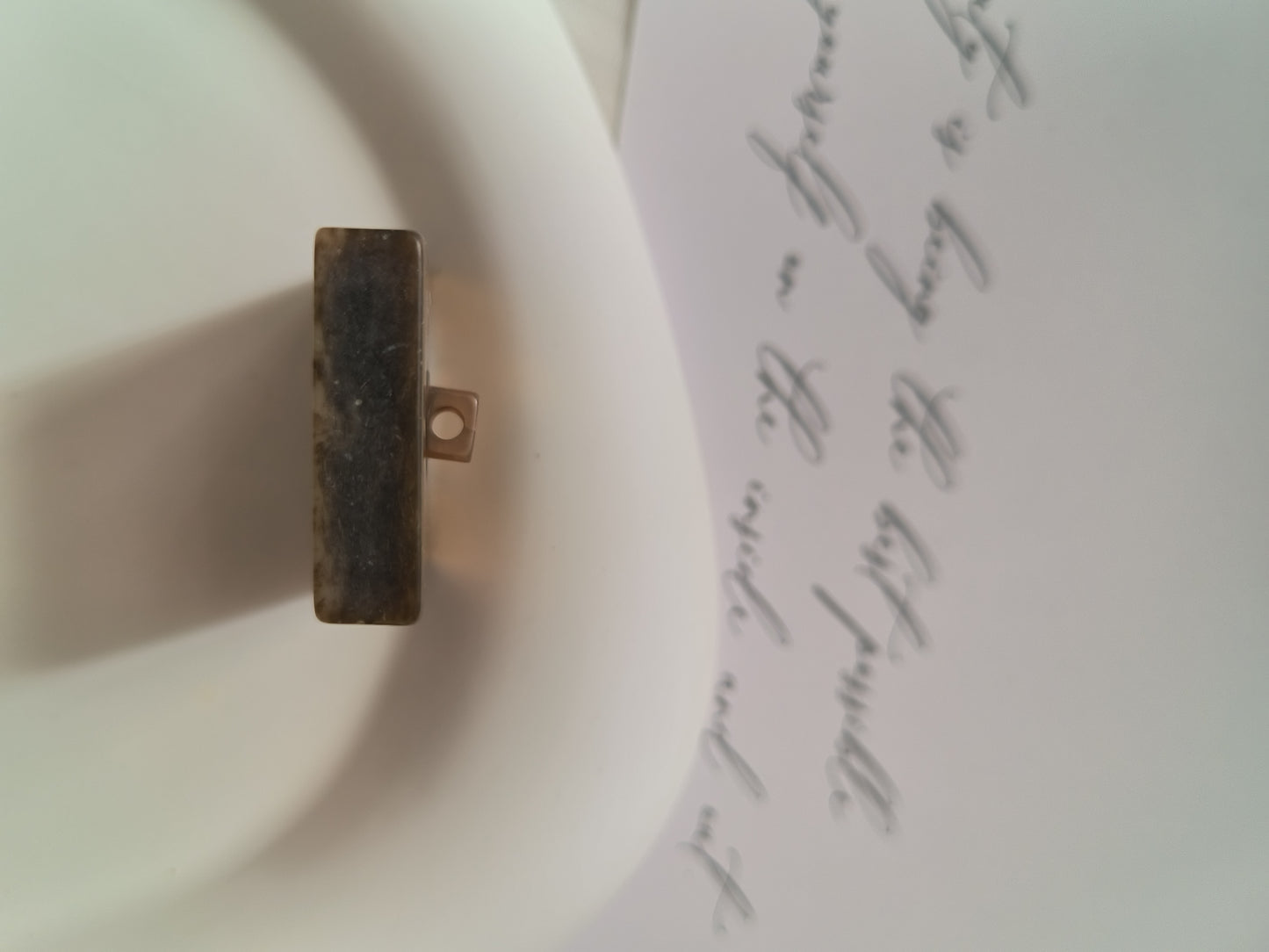 Irregular stone pattern button